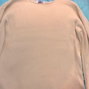 i am selling a yellow/tan/cream colored ong sleeve sweater.